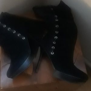 Black sued long boot,with silver metal holes on si